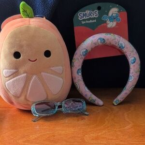Peach Plush and Smurfs Spa Headband Set and a pair of kids sunglasses.